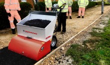 Walk-behind compact spreader